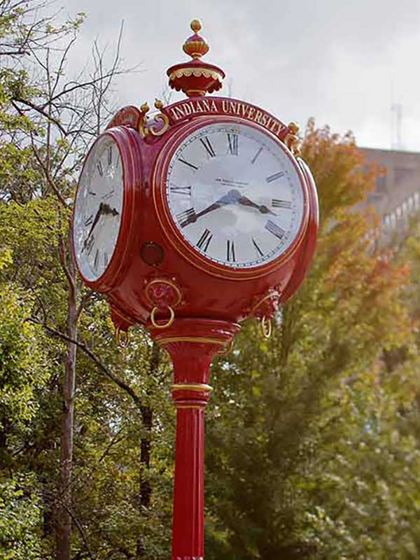 A photo of one of the red clocks on campus.